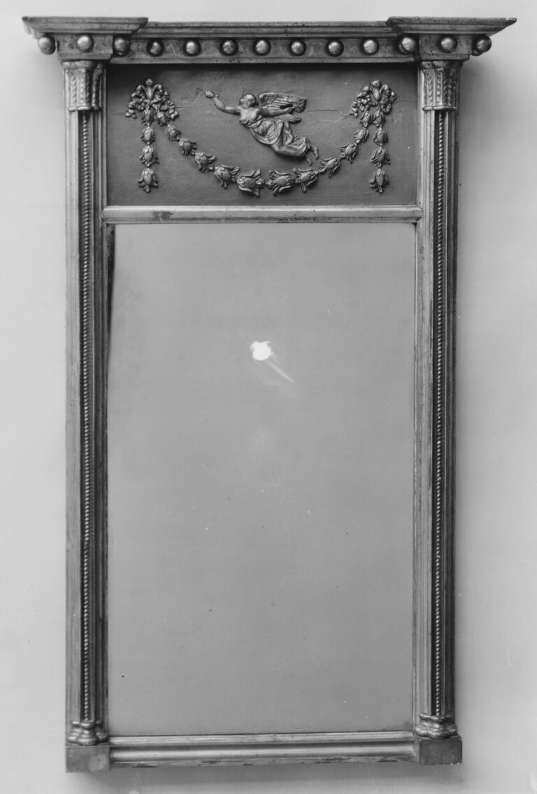 Looking glass in gilt gesso and verd antique on wood