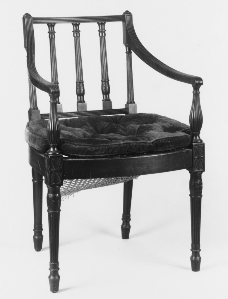 Square-back armchair in mahogany and cane