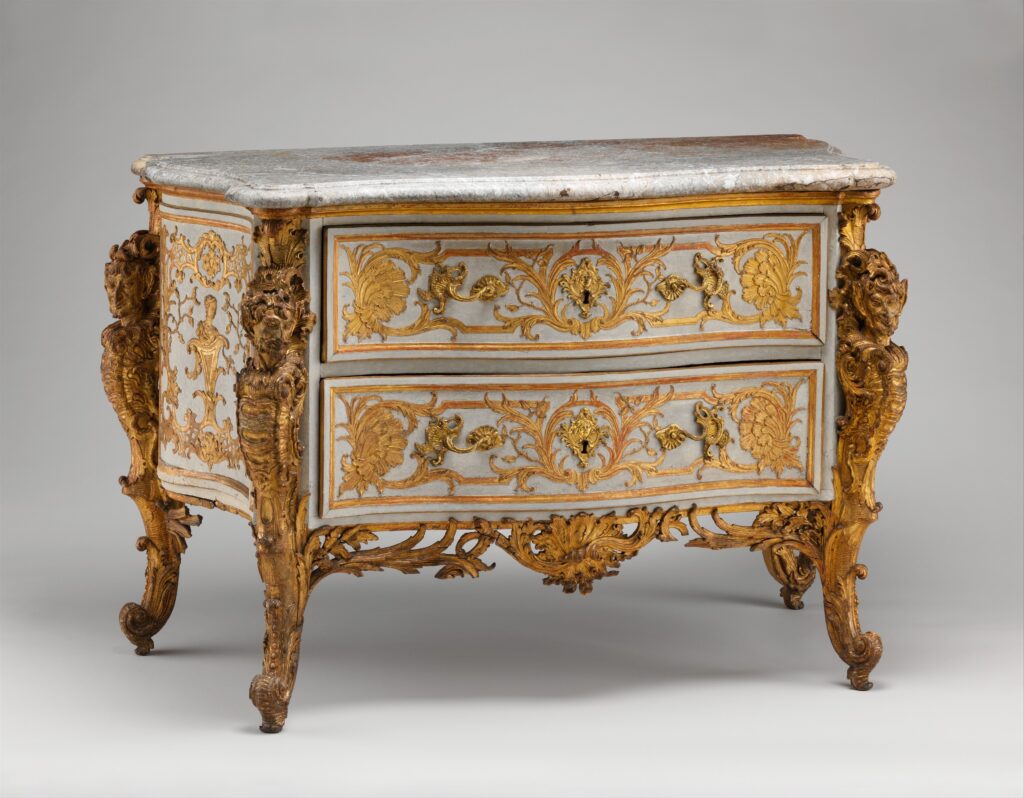 Carved and gilded commode