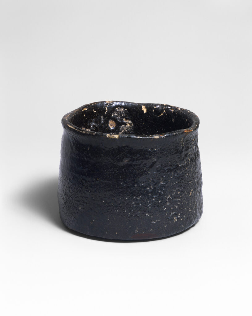 Black Seto chawan named Iron Mallet, a stoneware tea bowl with a black glaze from the Mino kilns