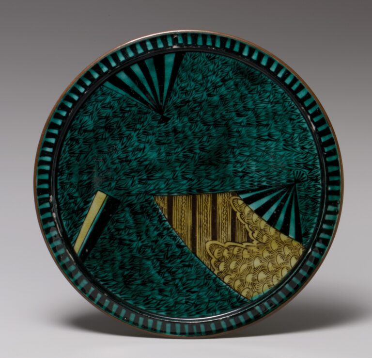 Kutani ware plate: round dark green plate painted with overlapping fans, one section in gold and yellow, with a ribbed rim