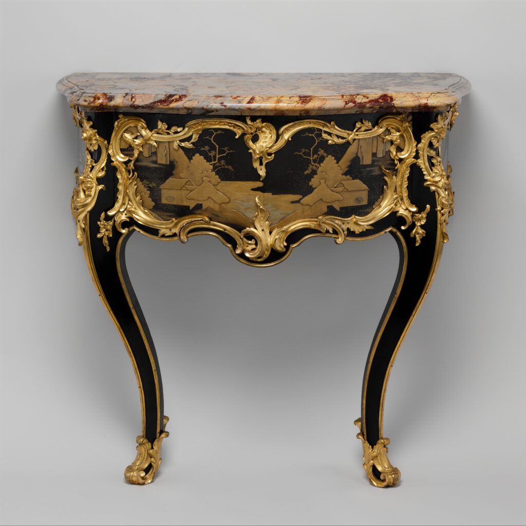 Side table with a black lacquered drawer front decorated with a gold landscape, a marble top, curving legs and gilt-bronze mounts