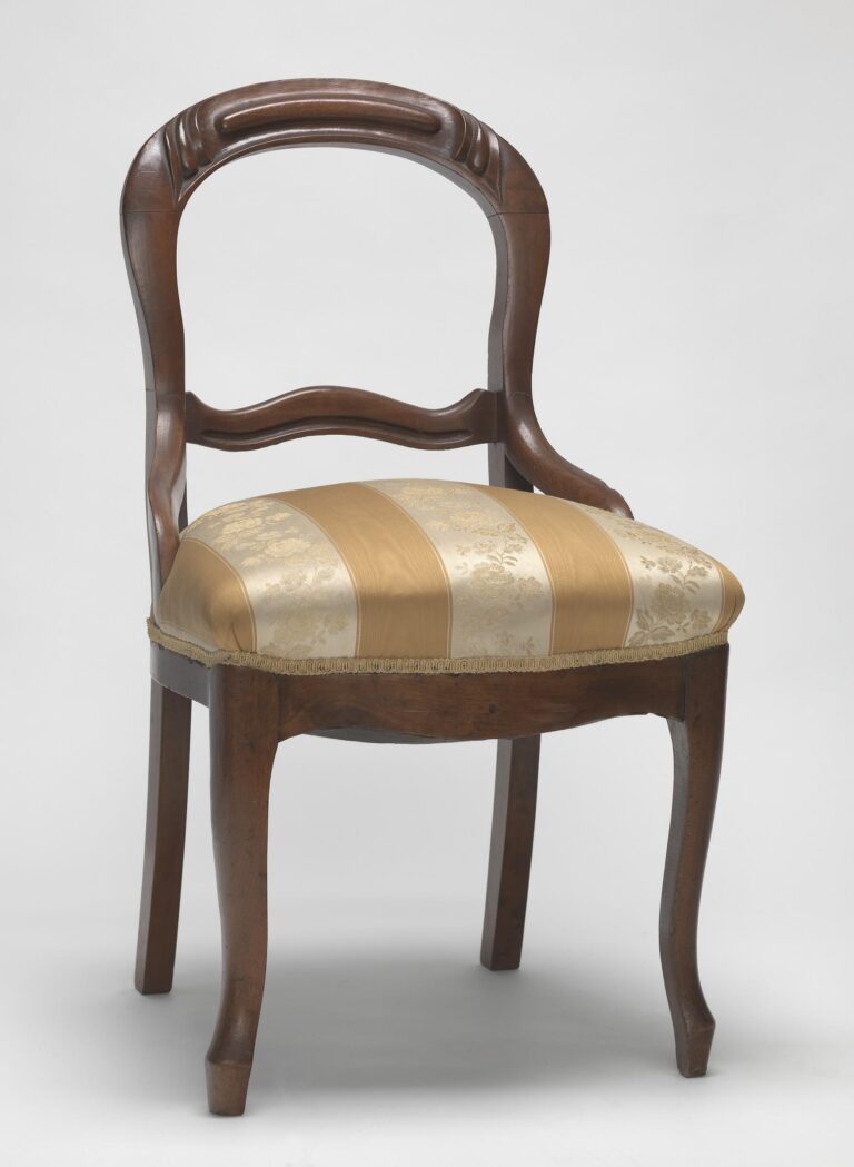 Antique Victorian chair of walnut with a balloon-shaped open back, carved top rail, curved cabriole legs and a seat covered in striped gold brocade